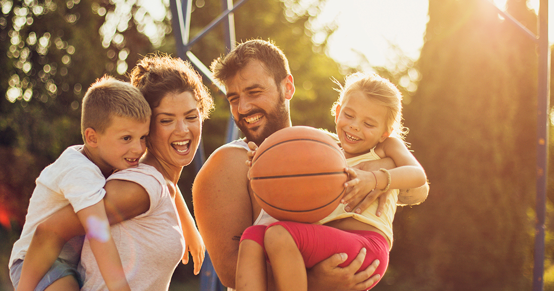 family playing on playground