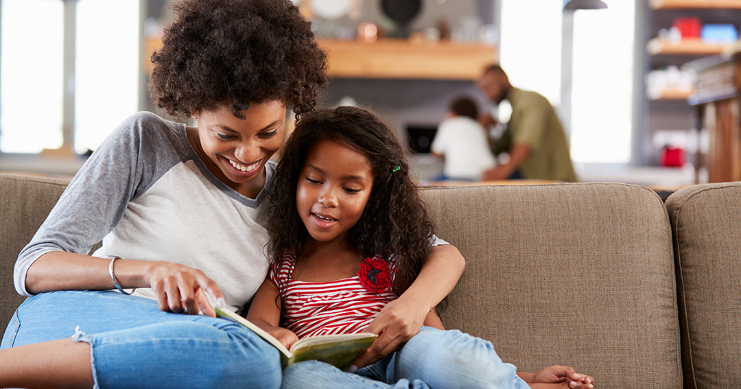 mother reading to child